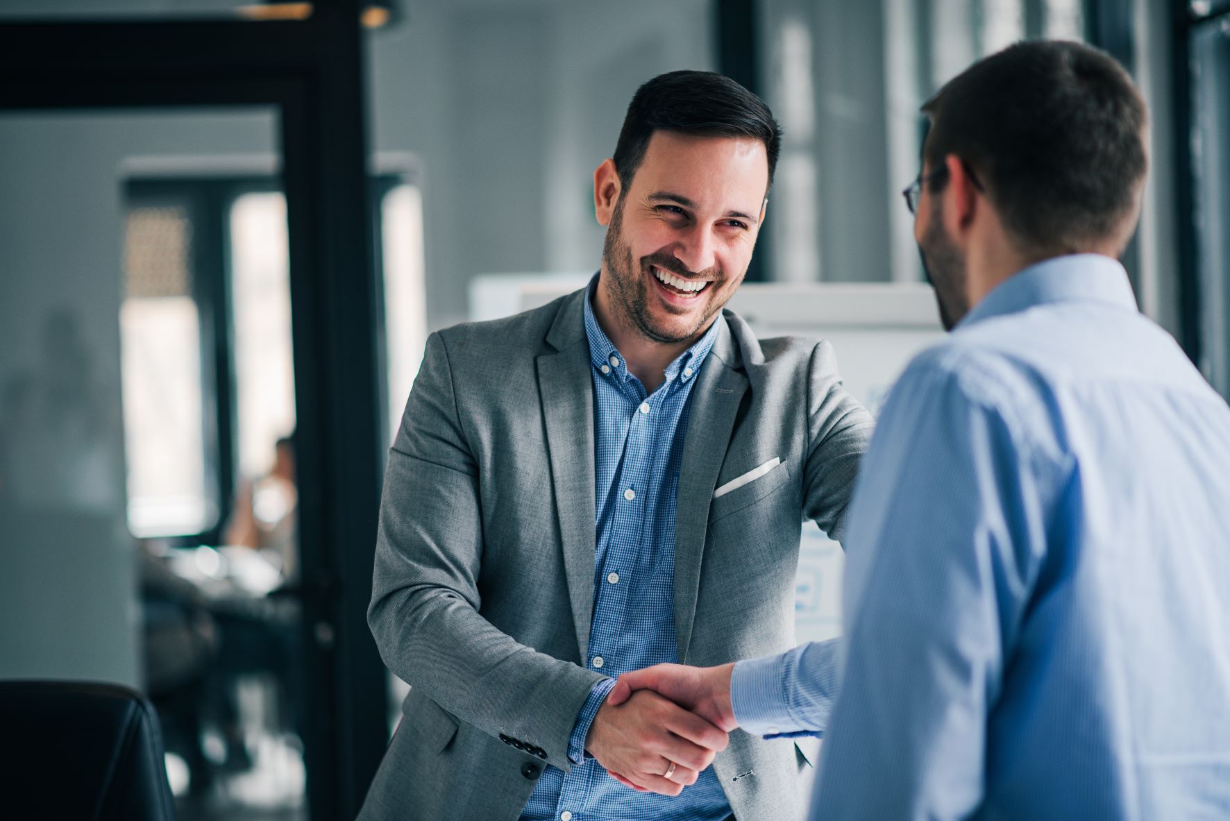 Female and Male colleague chatting