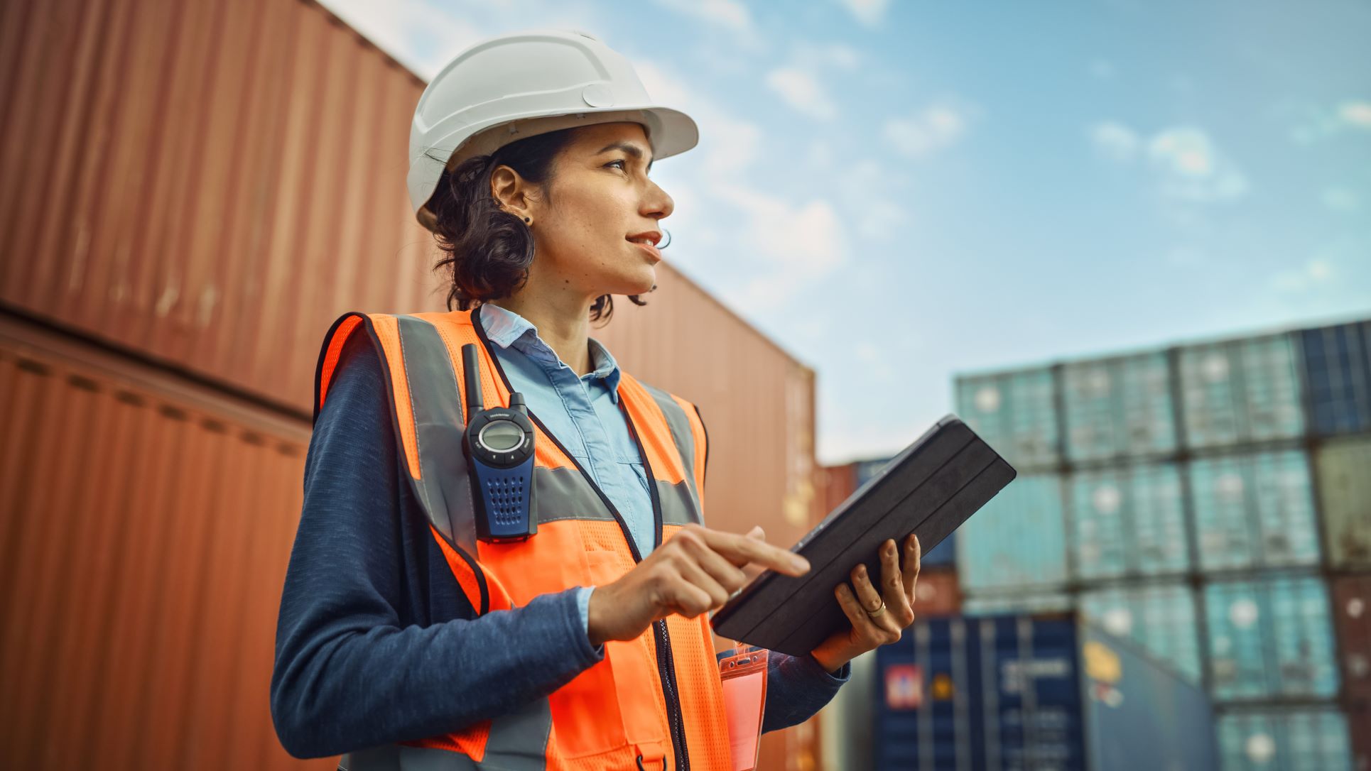 Female industrial engineer holding tablet